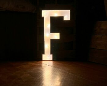 Marquee letter F