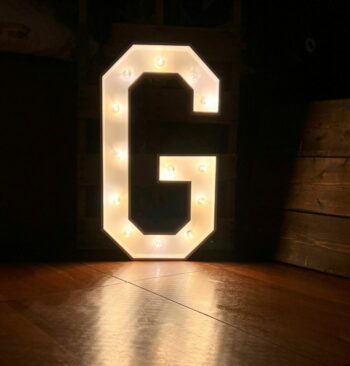 Marquee letter G