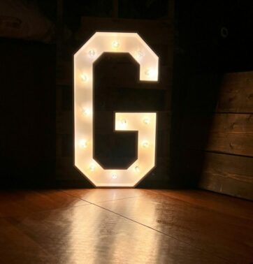 Marquee letter G