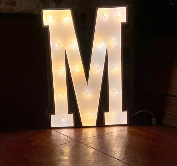 Marquee letter M