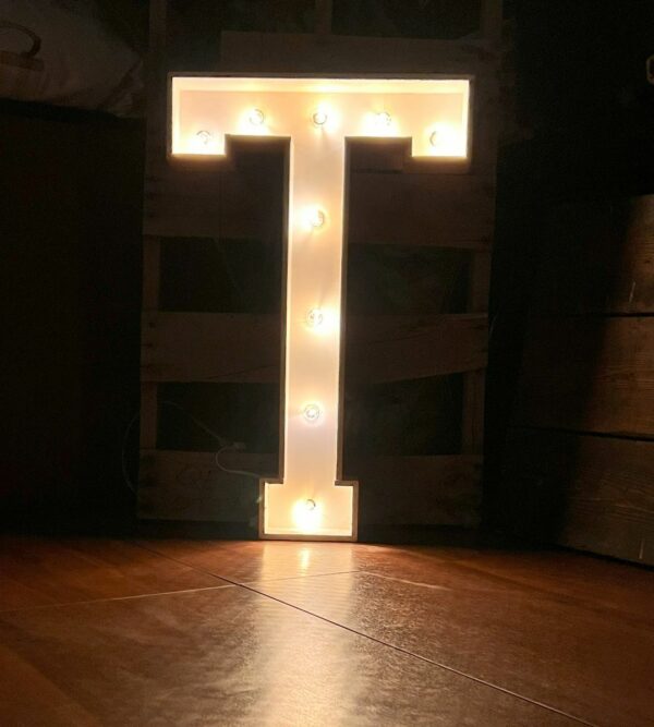 Marquee letter T