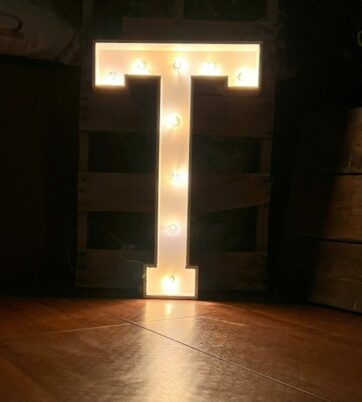 Marquee letter T