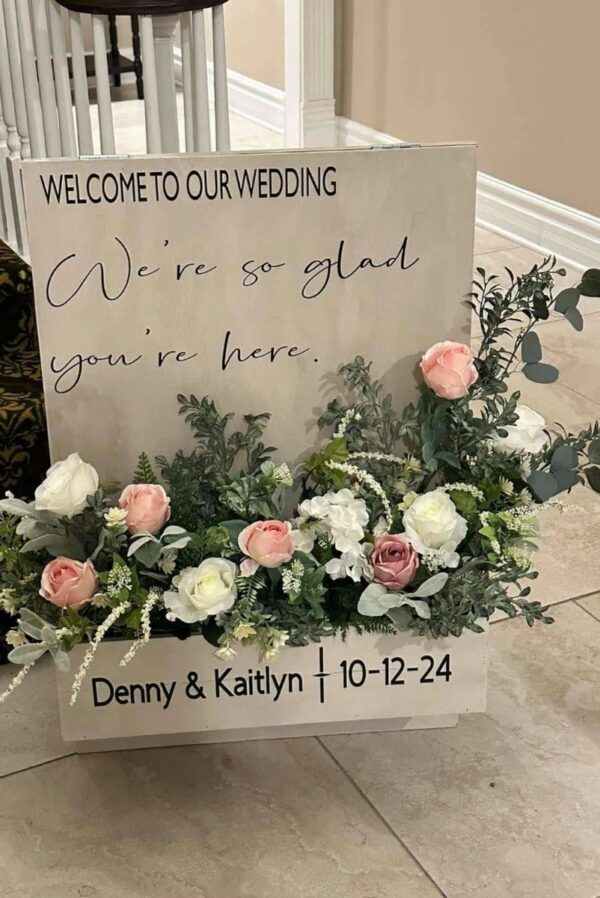 A frame welcome sign with flower box-personalized